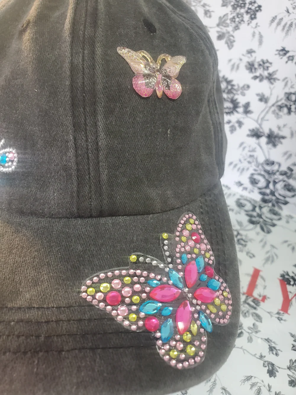 Hand Crafted Black Hat with Pink & Blue Jeweled Butterflies